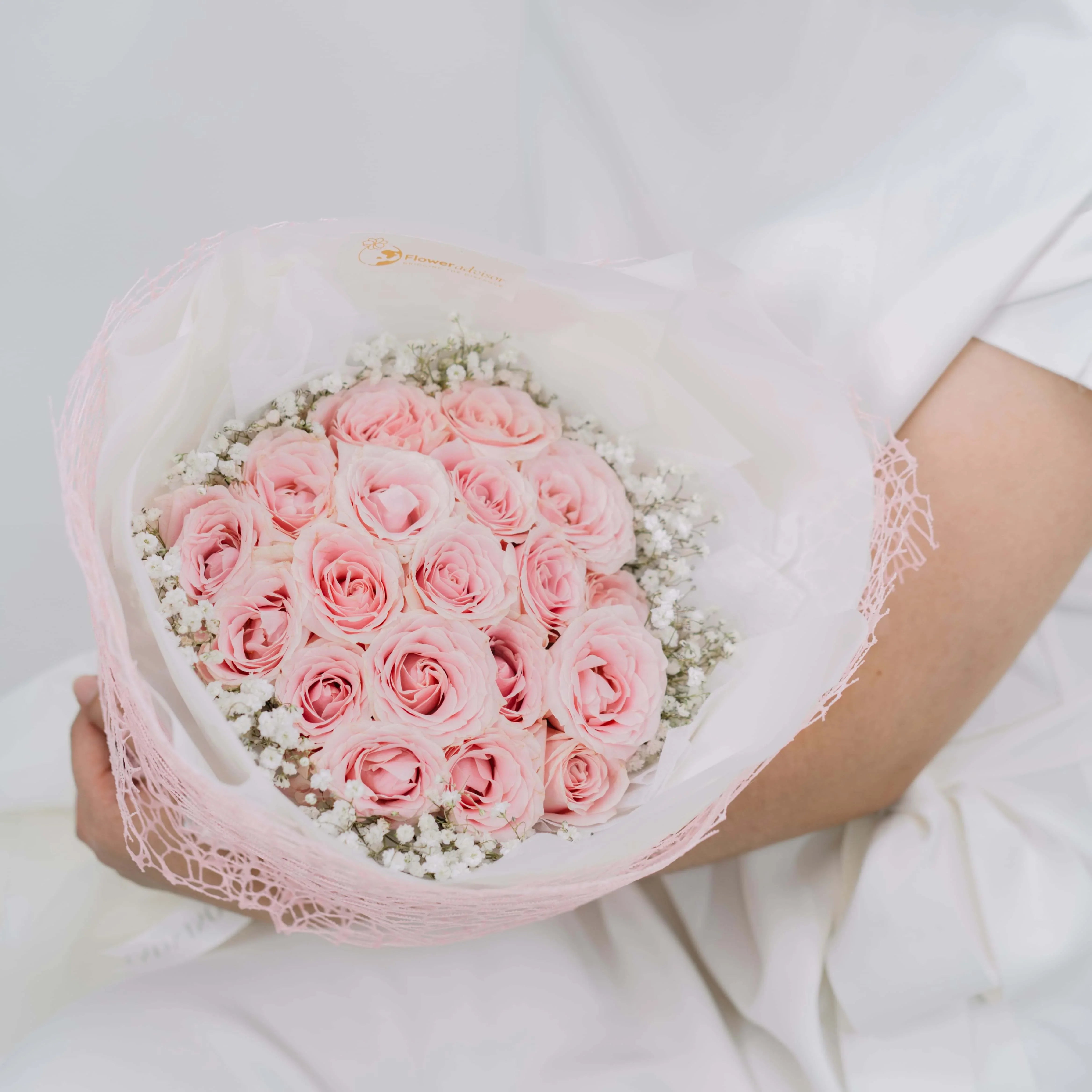 Bouquet of fresh pink roses and baby’s breath for flower delivery in Singapore