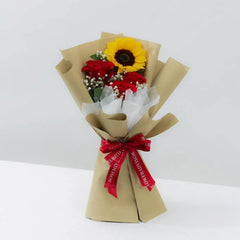 Bouquet with red roses, sunflower, and white baby's breath, ideal for flower delivery.