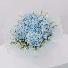 Blue hydrangea bouquet with white flowers, elegant arrangement for flower delivery