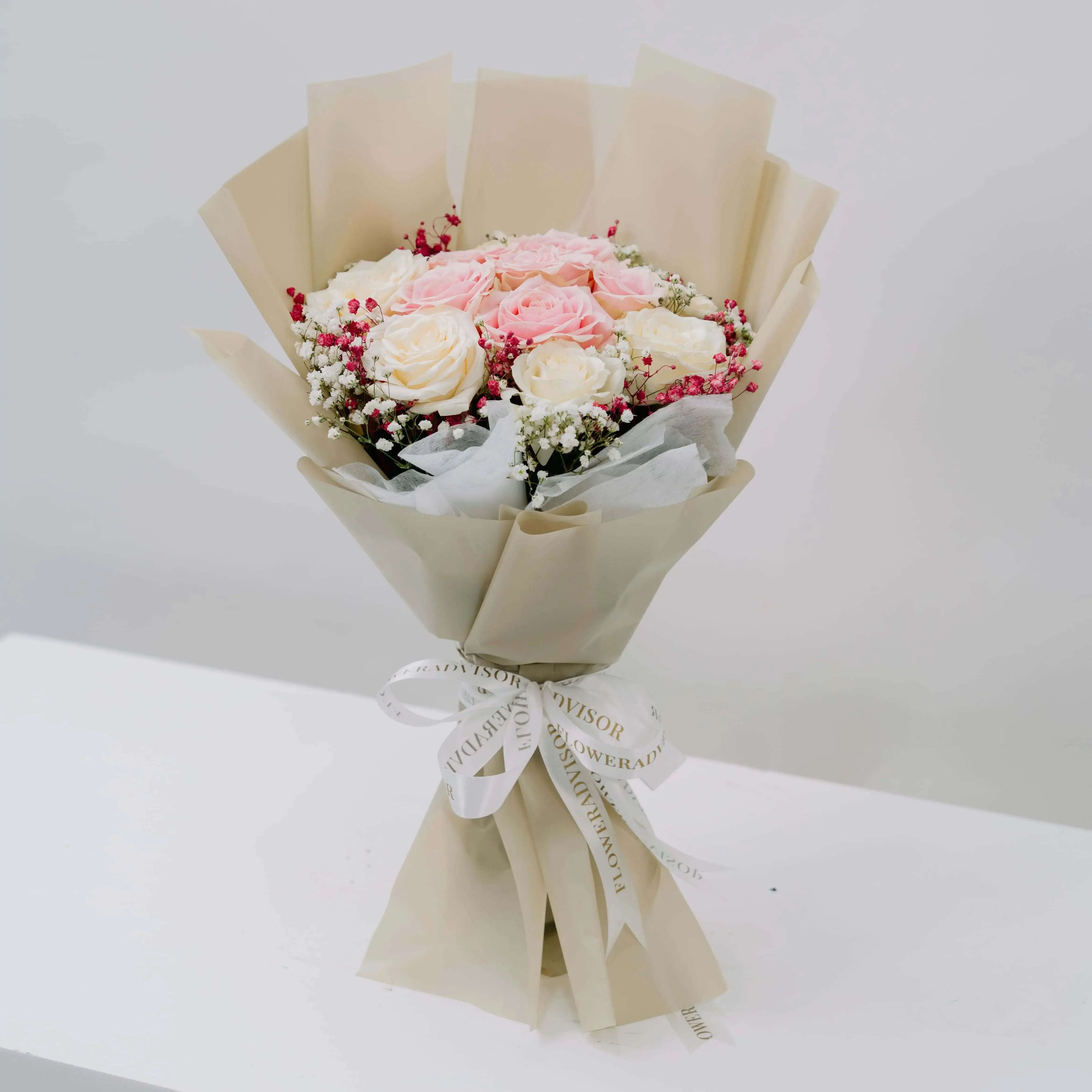 Elegant bouquet with pink and white roses for flower delivery in Singapore