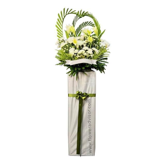 Elegant white lily and yellow flower stand arrangement for flower delivery in Singapore