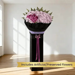 Purple chrysanthemum and orchid sympathy bouquet for flower delivery in Singapore