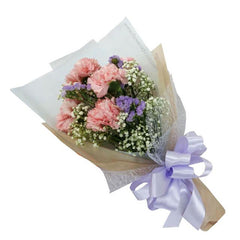 Pastel pink carnation bouquet with lavender and baby's breath, wrapped and ready for flower delivery